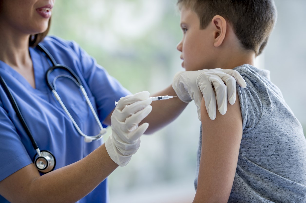 Doctor giving chickenpox vaccine